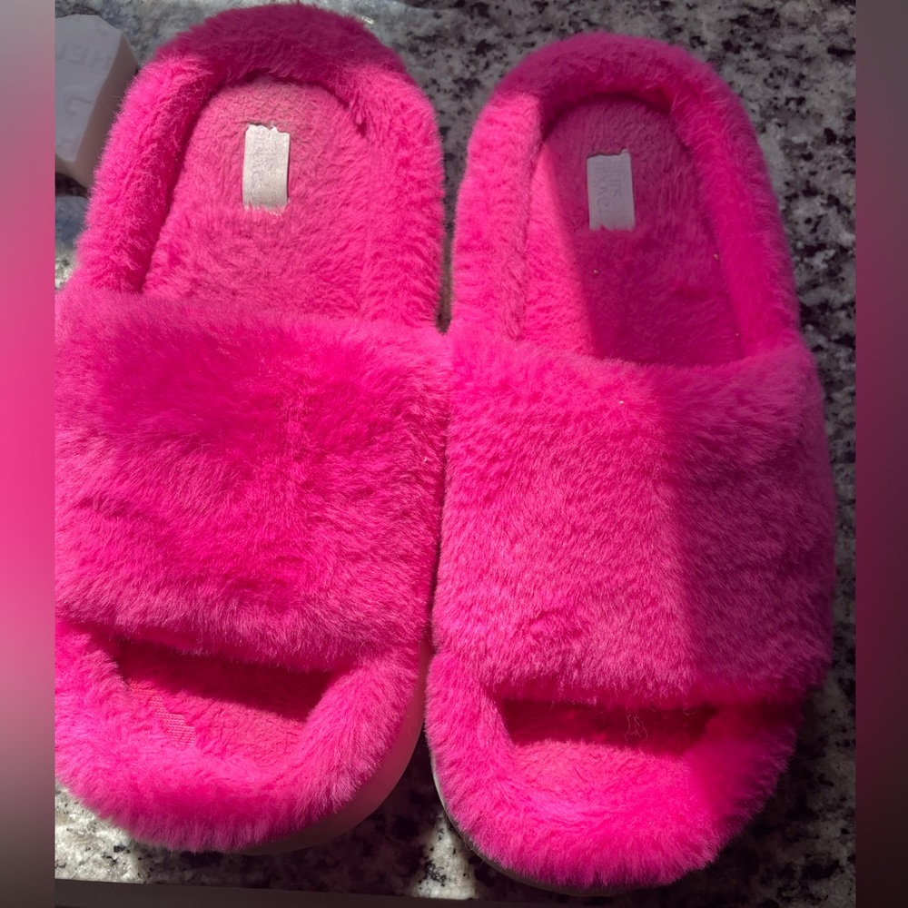 Pink fluffy slippers